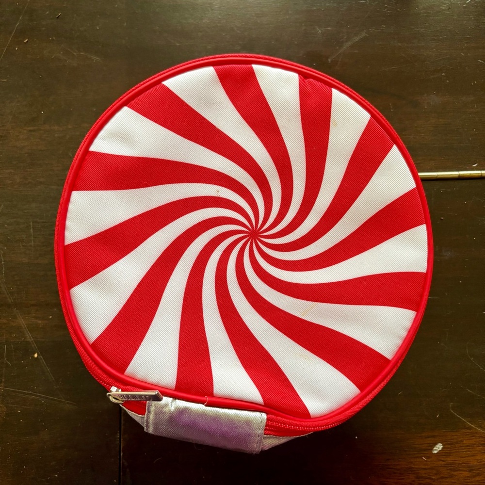 3 FOR $20: Clinique peppermint candy cosmetic bag. Add to bundle.